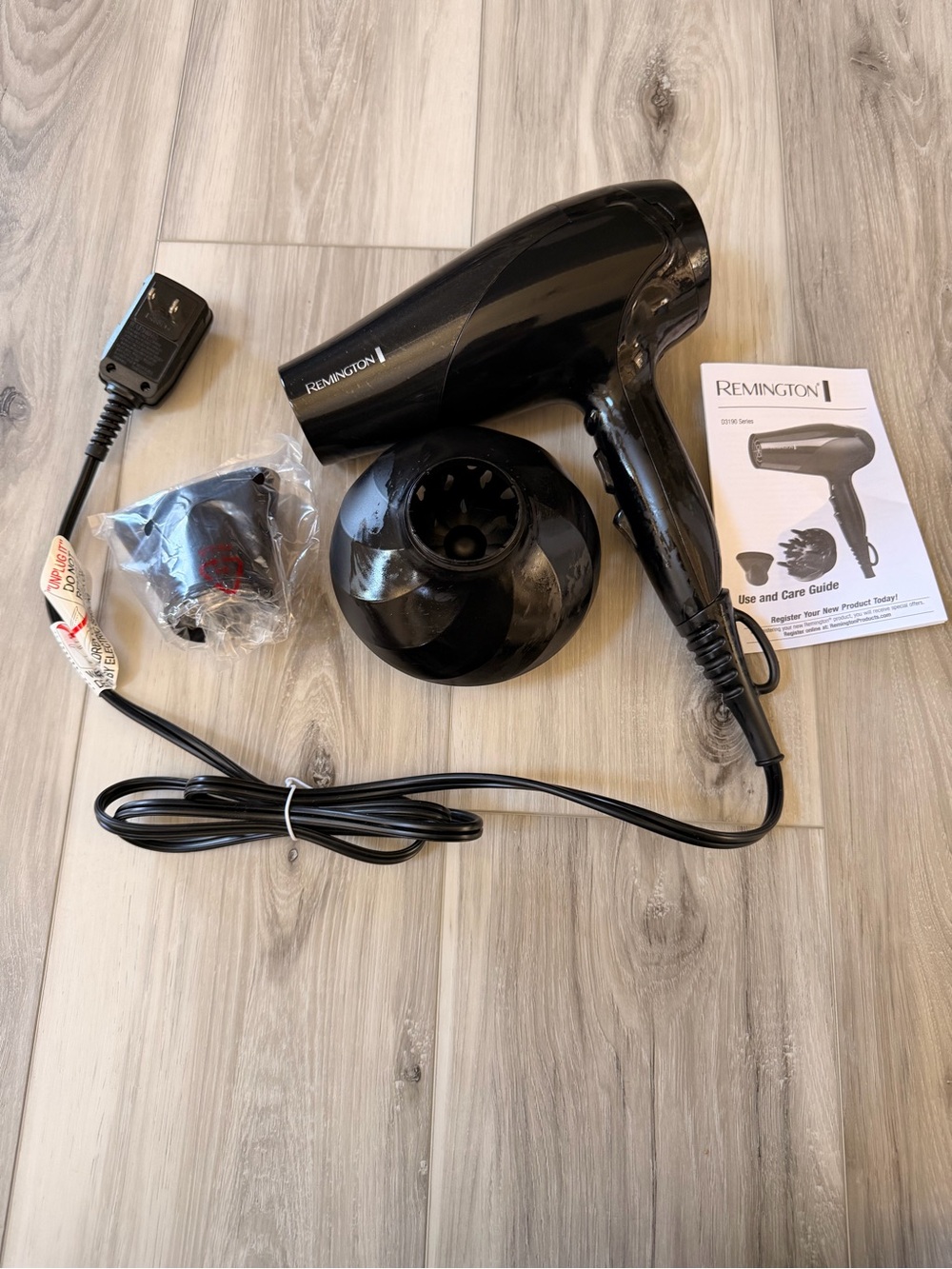 Remington Black Hair Dryer with Diffuser and Nozzle Attachments